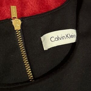 Calvin Klein Black High Low Dress with Sleeveless Design and Crew Neck